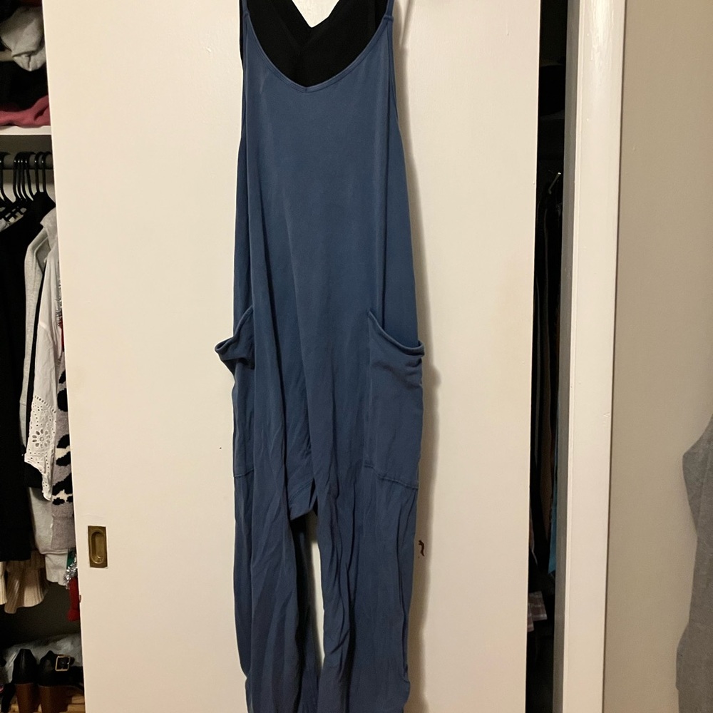 Hot shot onesie. Free people jumpsuit with black bralette